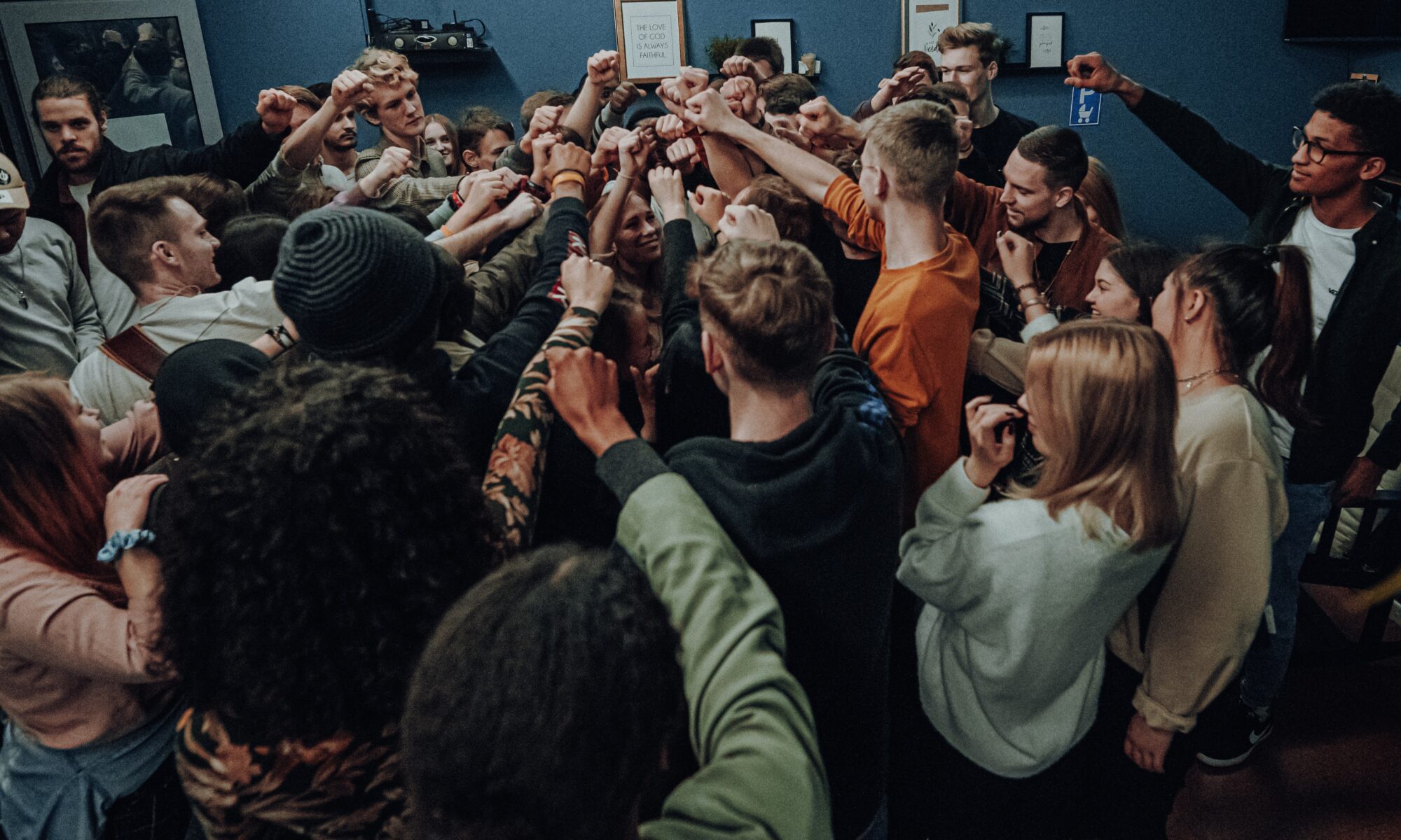 Youth huddling together